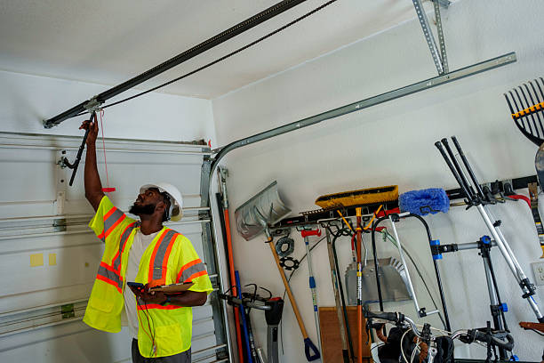 Professional Garage Door Panel Replacement technician working in Calera, OK